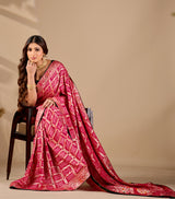  A pink and multicolor bandhani style saree