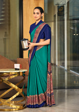  green and blue crepe silk saree with a red border under 1500