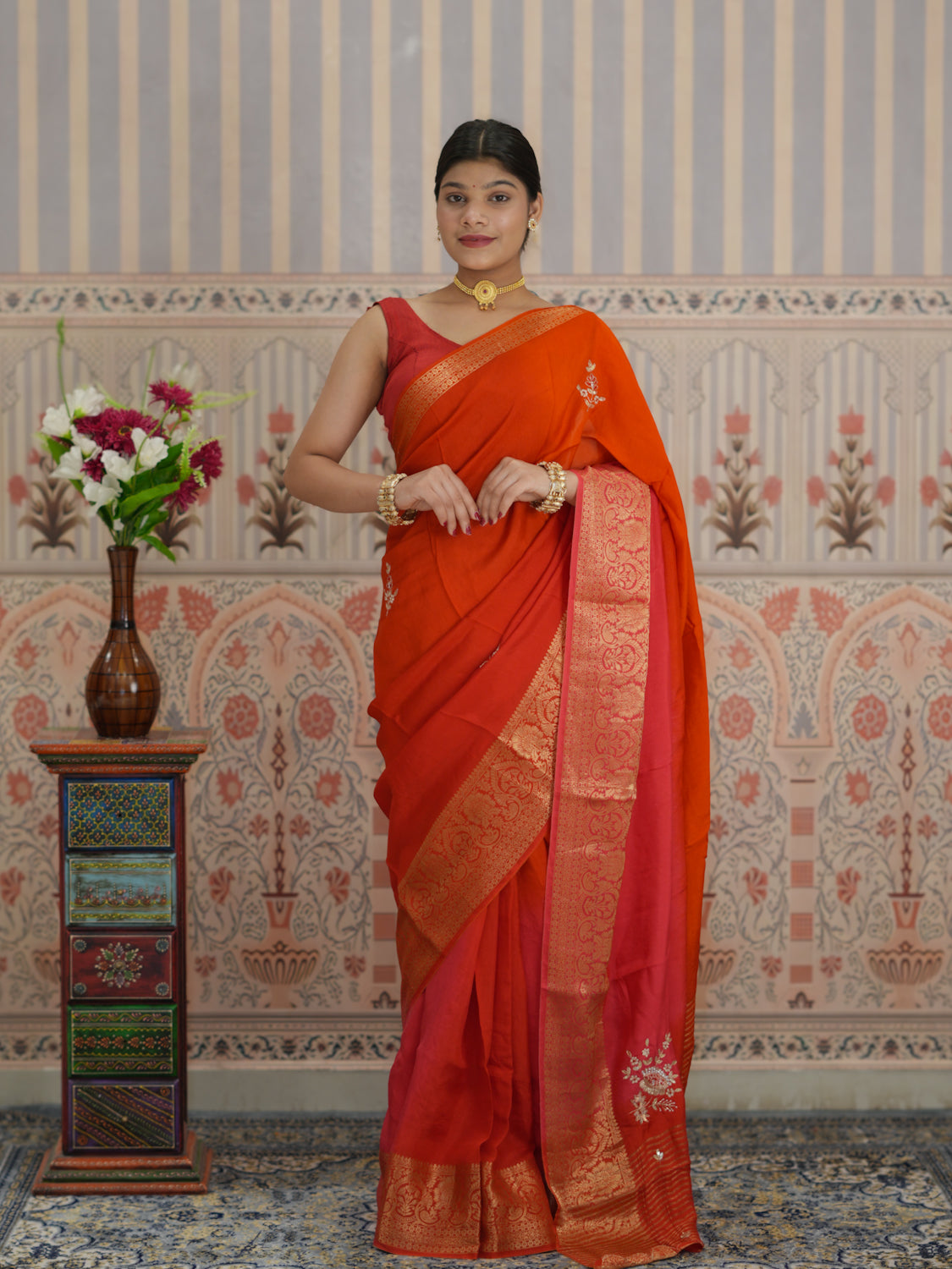 Red and orange saree with zardozi work and Banarasi style