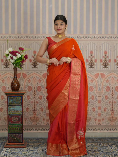 Red and orange saree with zardozi work and Banarasi style