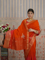 Red and orange saree with zardozi work and Banarasi style