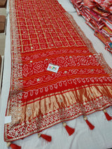 Bandhani style design saree for wedding in red colour