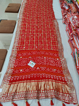 Bandhani style design saree for wedding in red colour