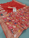 A red and gold Jaipuri Bandhej Weaving saree 