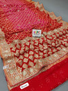 A red georgette saree with gota patti