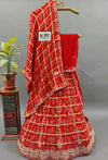  Gaji Silk Bandhani Ghatchola style lehenga in red colour