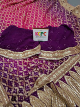 A designer pure khaddi georgette neemzari bandhej gotapatti zaridoji work saree in pink and purple colors 