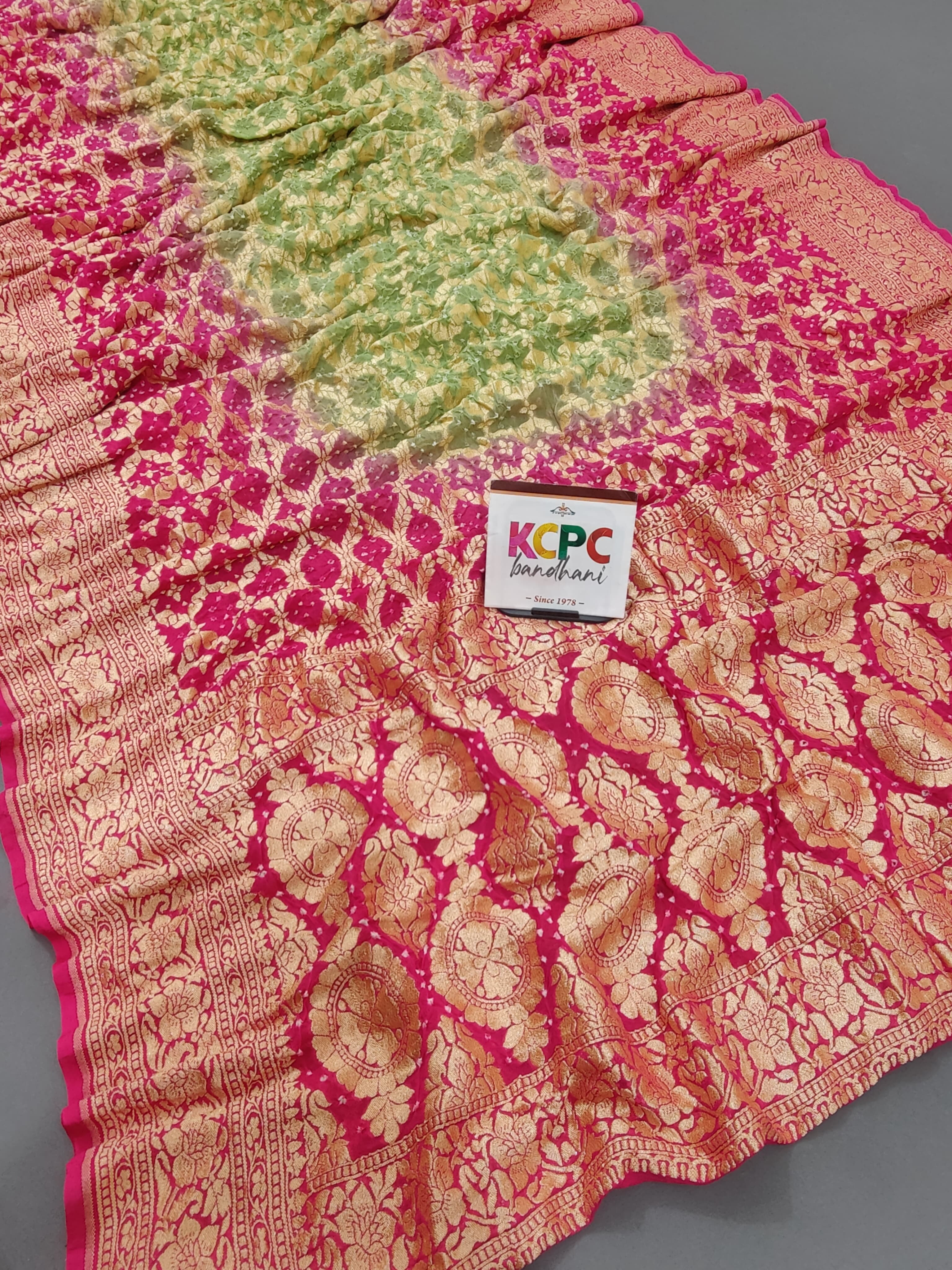 KcPc New Launch Pure Khaddi Georgette Upada Neemzari Bandhej SareePista Pink