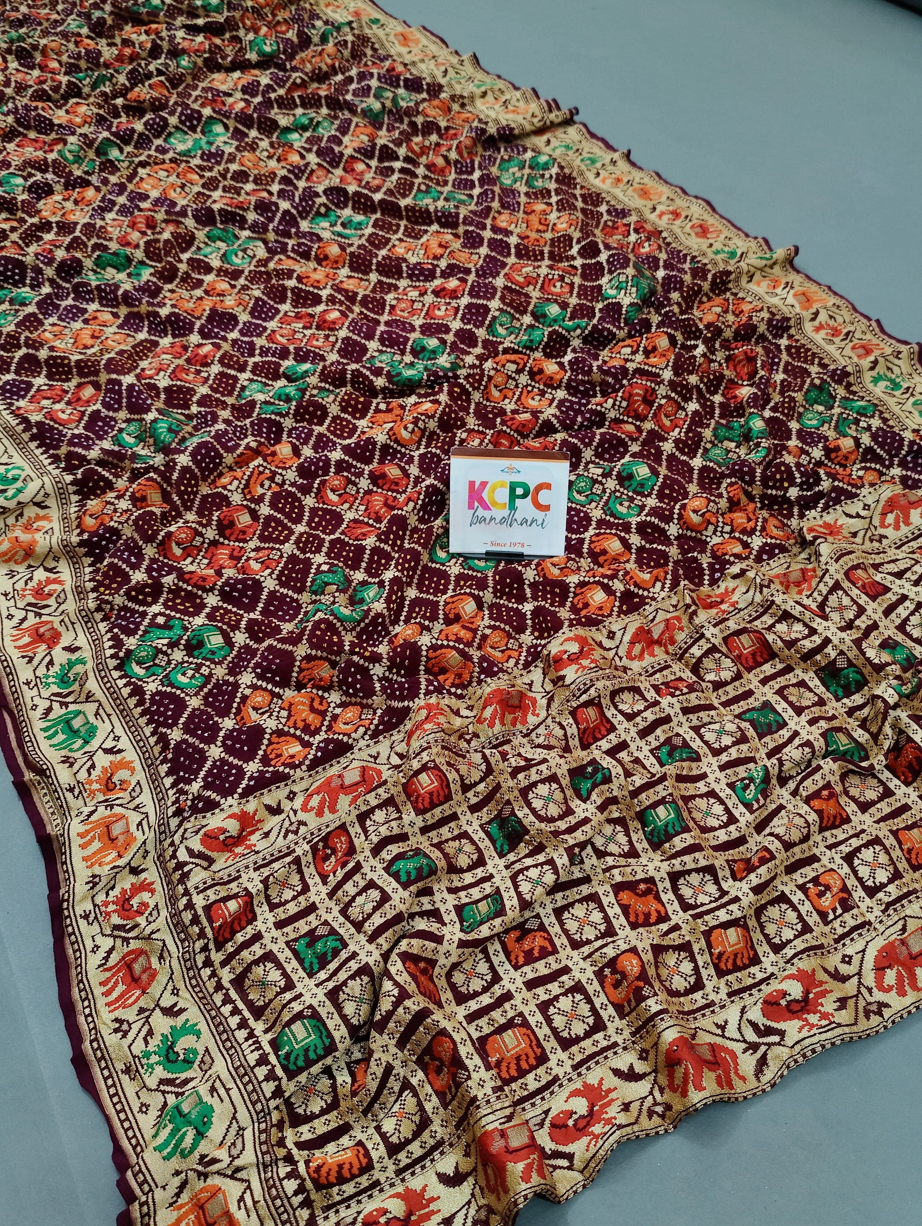 KcPcFigure Design Khaddi Georgette Janglaw Bandhani Neemzari Saree Wine