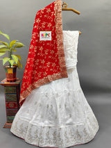 A white Dola silk lehenga with gold handwork