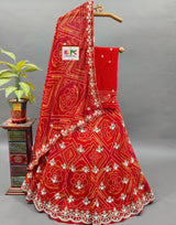 A red georgette bandhej with katdana gotapatti handwork Lehanga