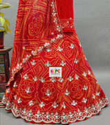 A red georgette bandhej with katdana gotapatti handwork Lehanga