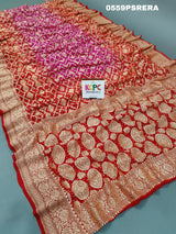 A red and beige georgette saree with floral embellishments andKhaddi Georgette Upada Neemzari Bandhej 