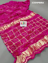 A pink silk bandhani gharchola saree 