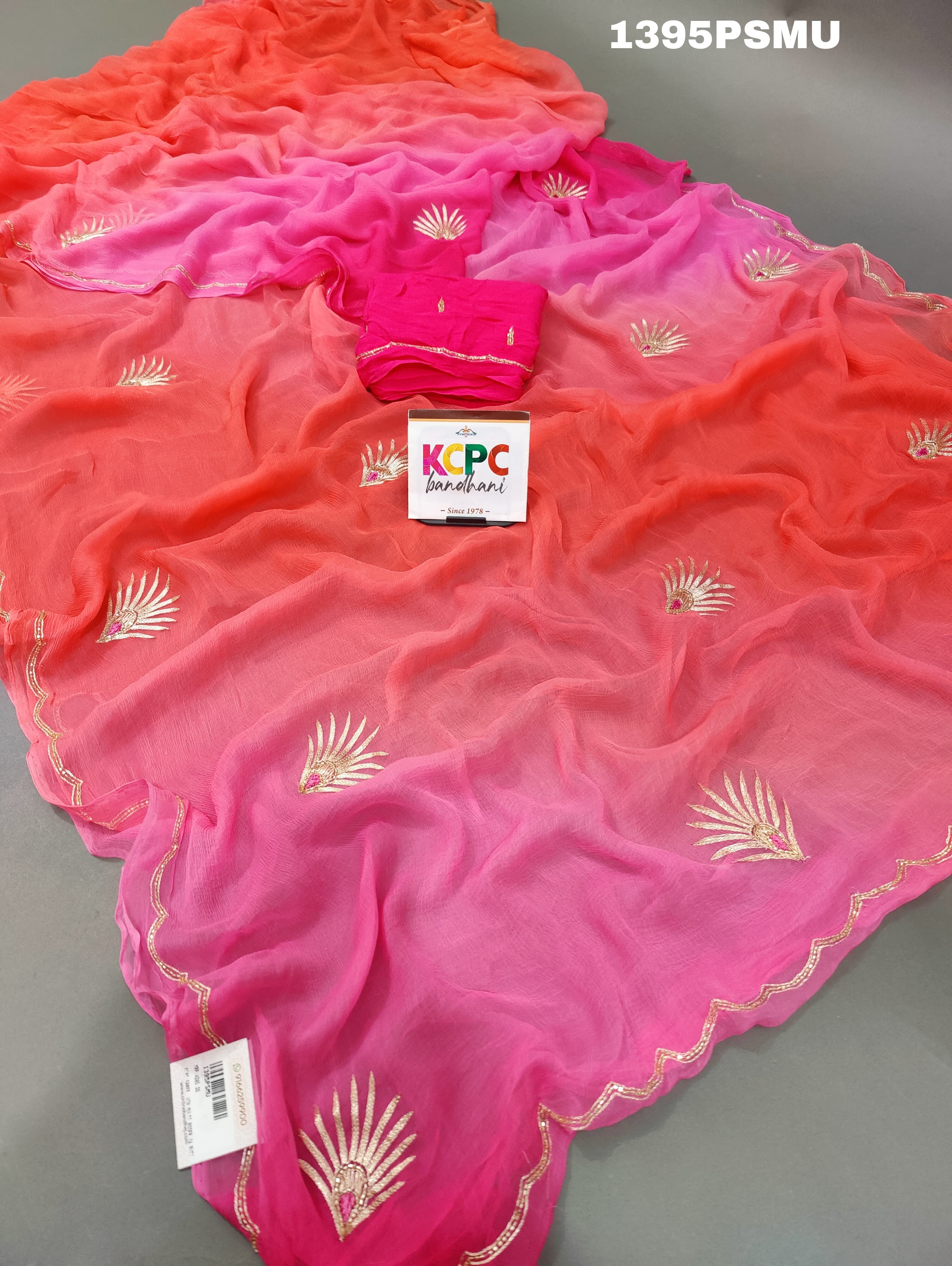 A pink chiffon jaipuri saree with zari sequence buti work 