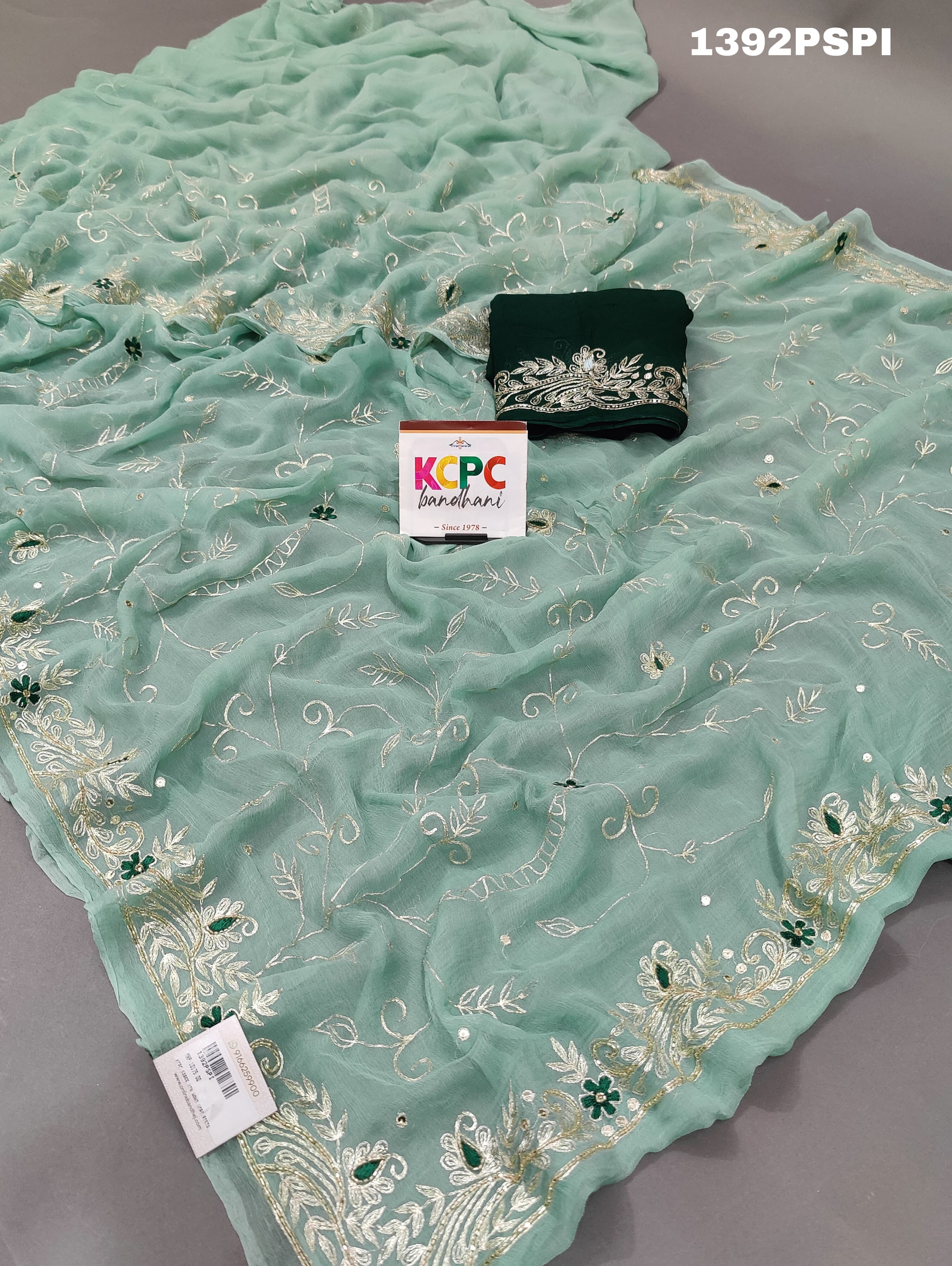 A traditional Rajputi saree in a light green color