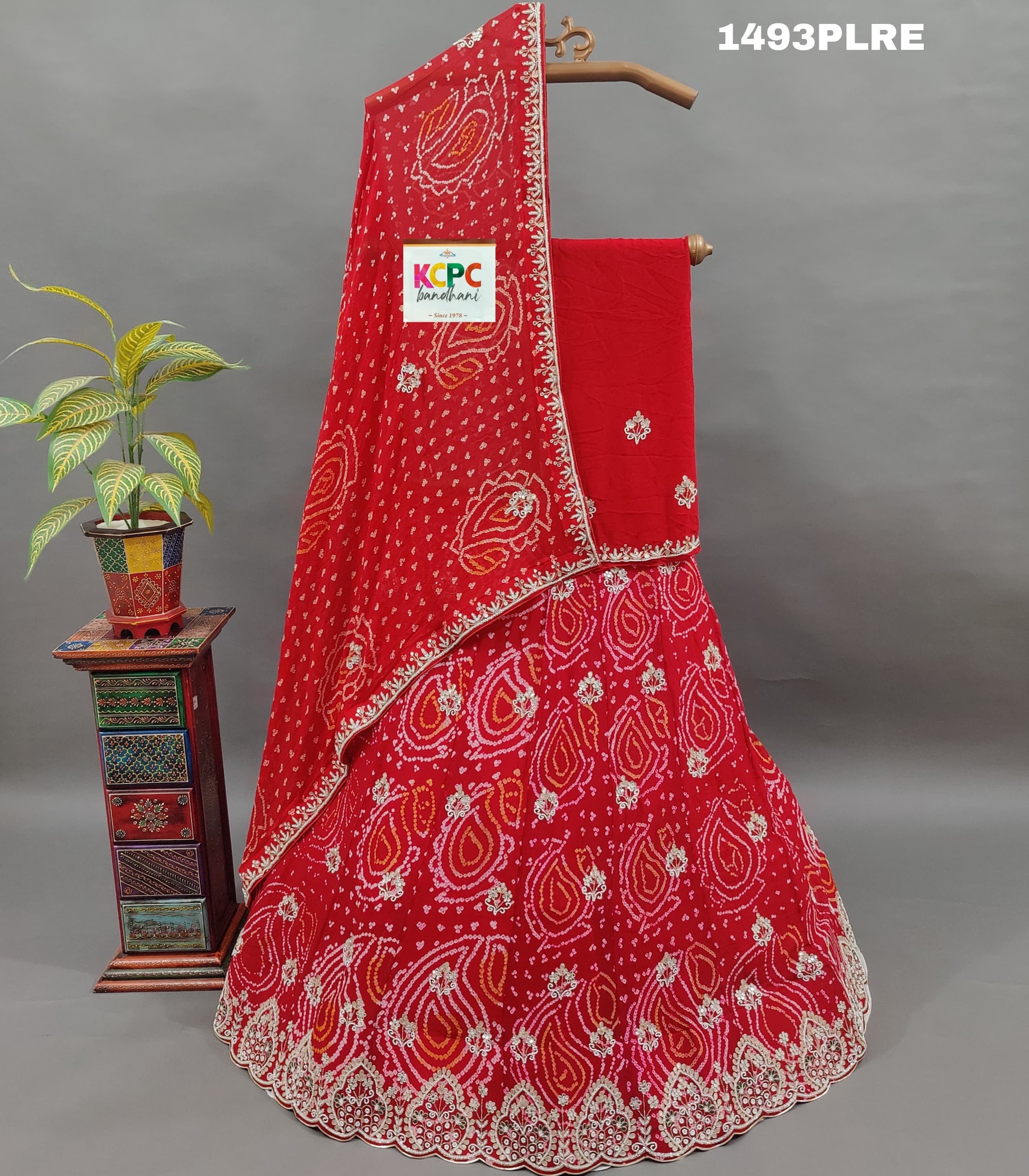A red lehenga with gota work