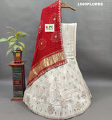 A red and white traditional lehenga with bandhani dupatta and zardoji gotapatti work
