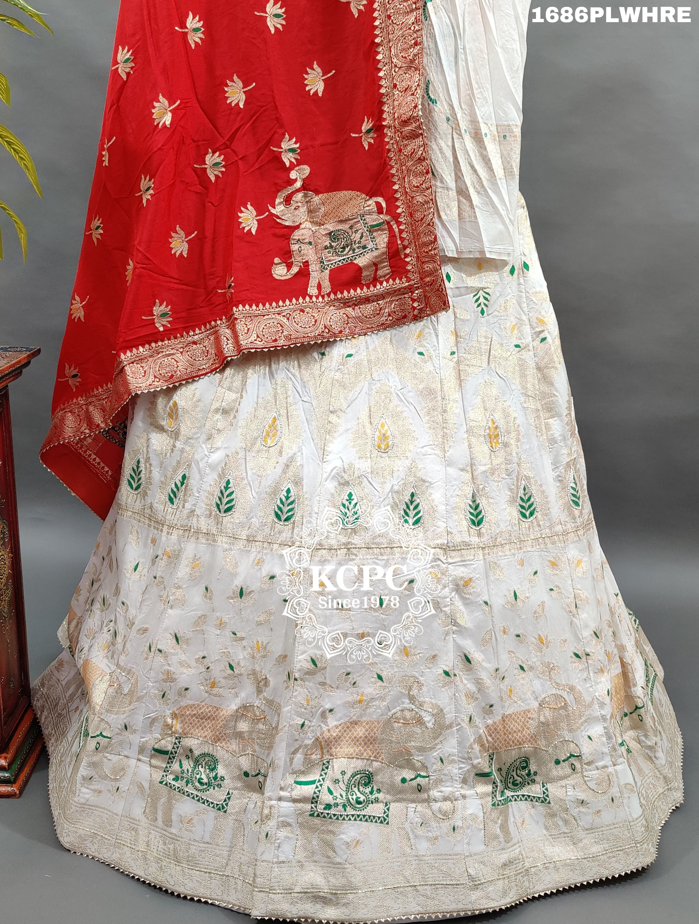 A traditional red and white Banarasi silk lehenga 