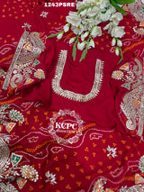 A red bandhani saree with gota patti work