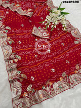 A red bandhani saree with gota patti work