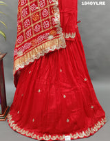 A red pure gaji silk lehenga with bandhani gharchola dupatta