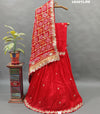 A red pure gaji silk lehenga with bandhani gharchola dupatta