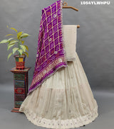 A pure Upada silk lehenga with a Gaji silk Bandhani dupatta set