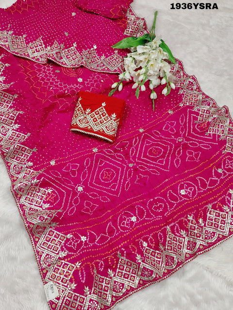 A pink saree with Bandhej pattern and Gotapatti work