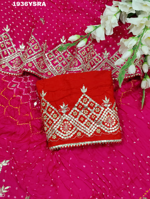 A pink saree with Bandhej pattern and Gotapatti work