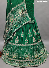 A green lehenga set with gotapati work
