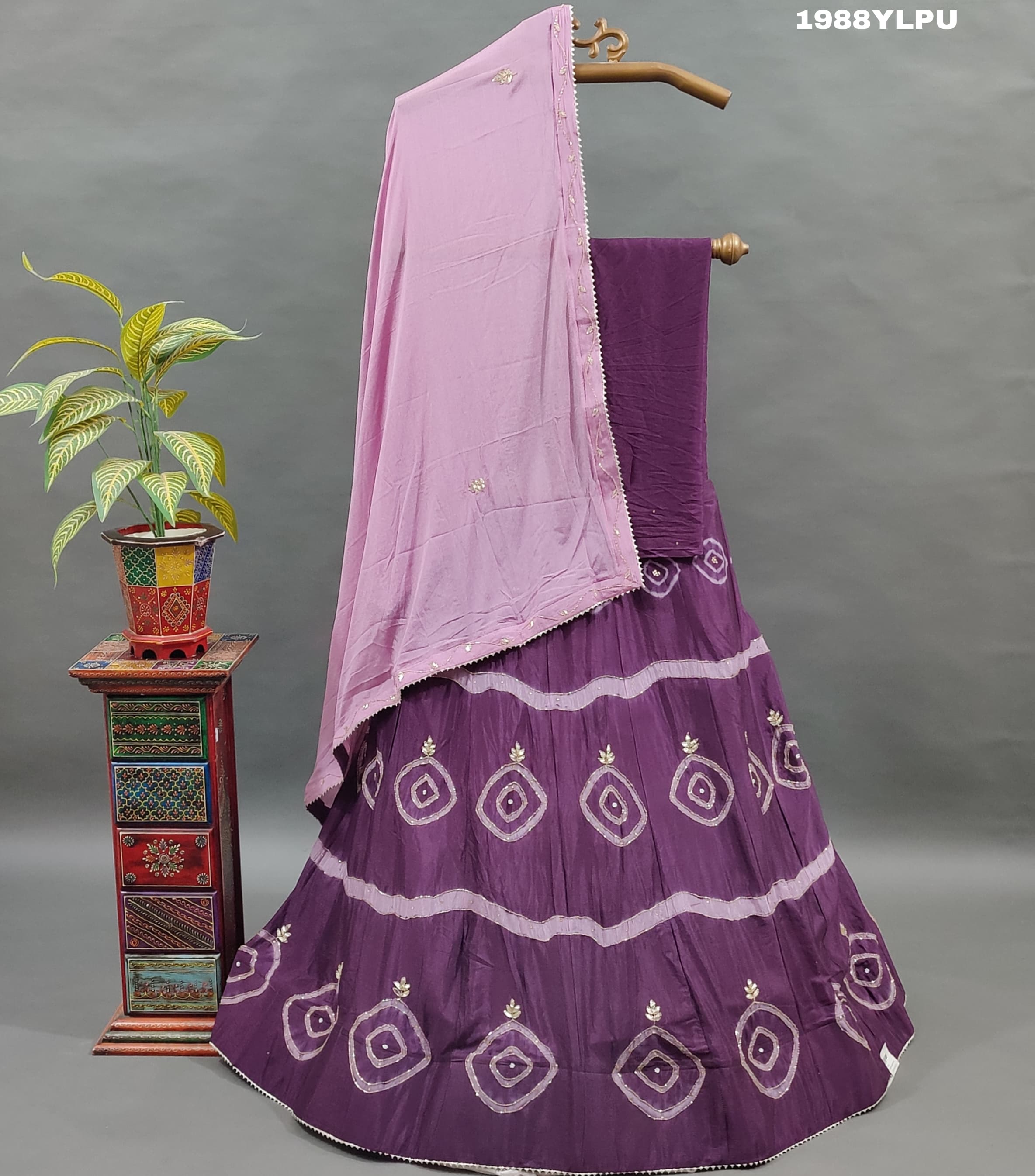 A pure upada silk lehenga set with cutdana workin purple color