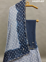 A lehenga set with a blue and gray colordouble shade Bandhani cutdana work
