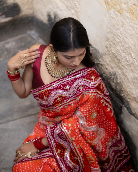 Red saree with white patterns Gaji Silk Bandhani Heavy Gotapatti Work 