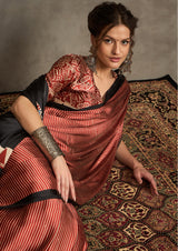 A maroon and black silk saree with Ajrak print