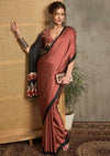 A maroon and black silk saree with Ajrak print