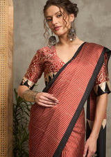 A maroon and black silk saree with Ajrak print