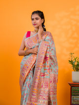 A orenge cotton silk saree with Kashmiri style patterns and Meenakari weaving work.