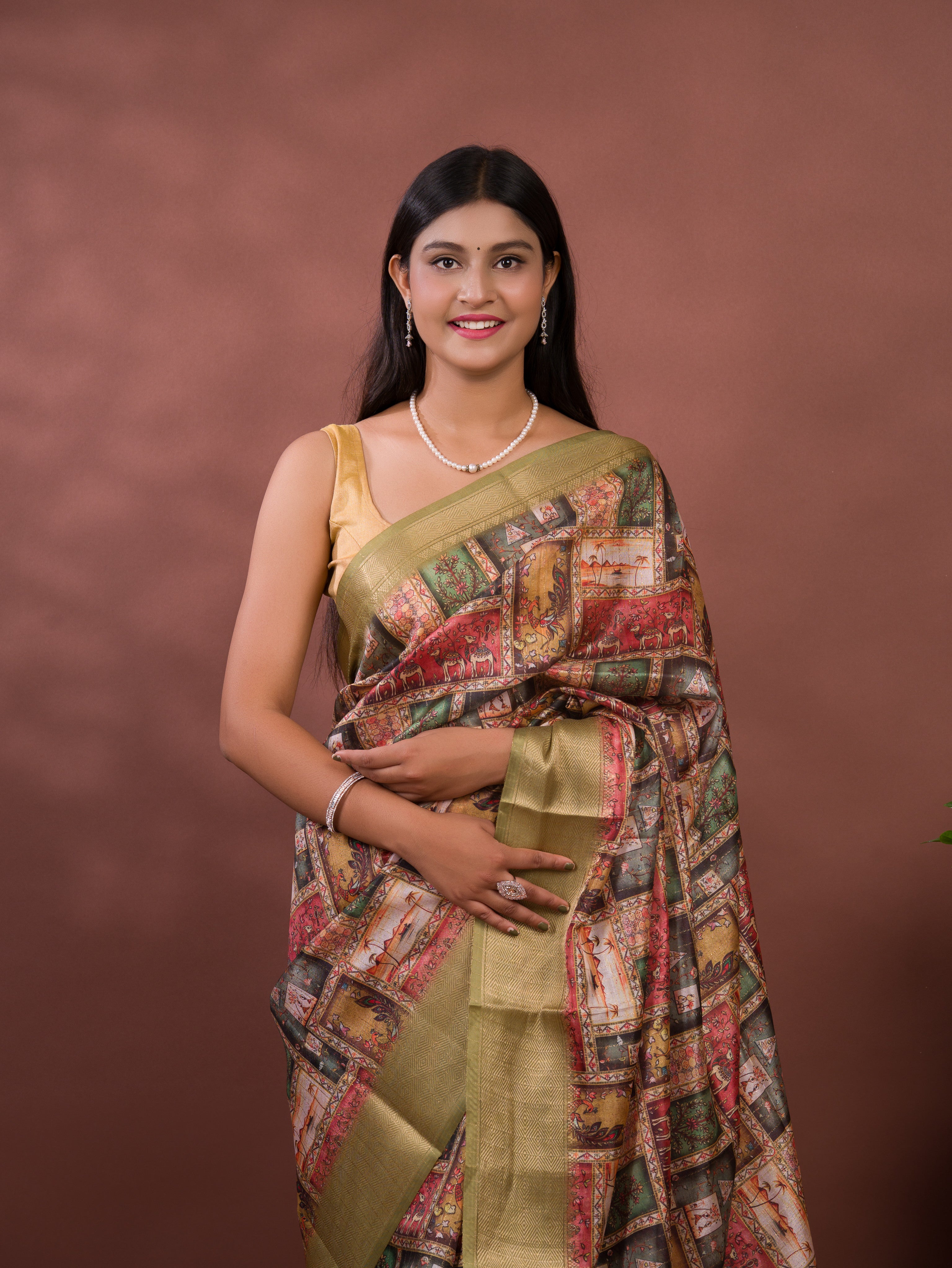 A saree with a kalamkari style pattern in green colors, with zari weaving and a Banarasi border. under 1000