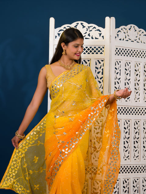  Yellow saree with white patterns  Chiffon Bandhani Style With Gotapatti Work Saree