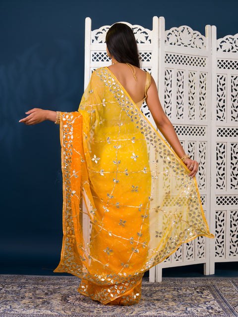  Yellow saree with white patterns  Chiffon Bandhani Style With Gotapatti Work Saree