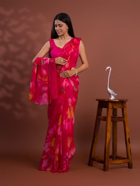 A vibrant pink saree with floral patterns Georgette Flower Printed Style 
