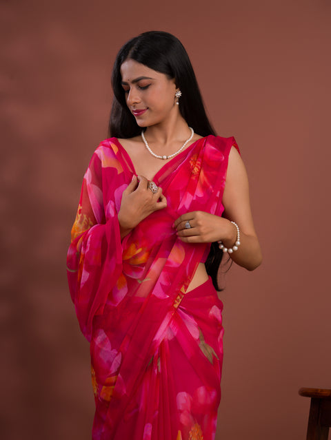 A vibrant pink saree with floral patterns Georgette Flower Printed Style 
