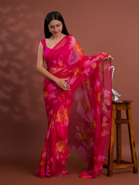A vibrant pink saree with floral patterns Georgette Flower Printed Style 
