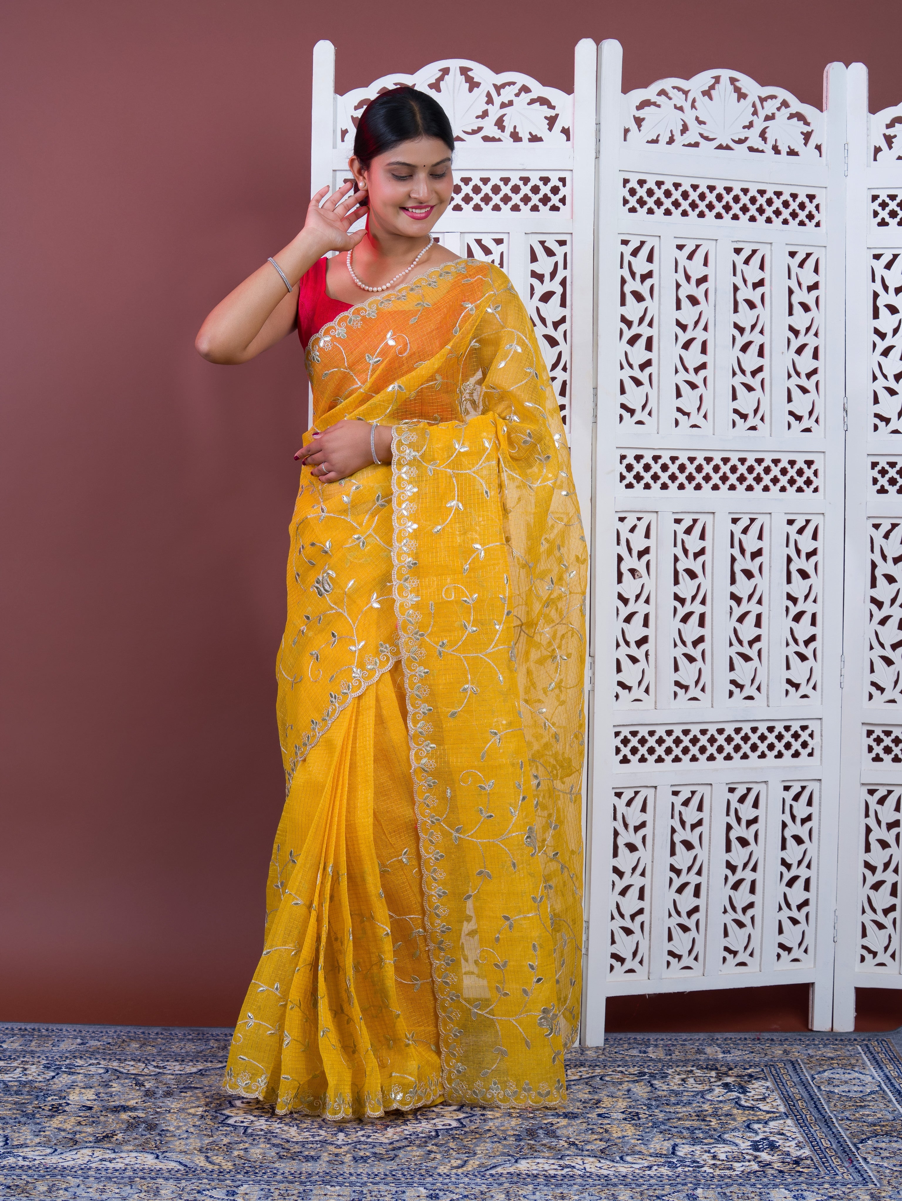 Gotapatti work in yellow colour saree