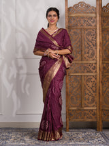 A wine and gold Upada silk saree with Bandhani style