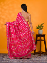 A pink saree with white patterns withCotton silk Bandhani Gotapatti Work Saree
