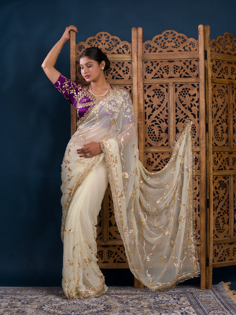 By Traditional  Saree