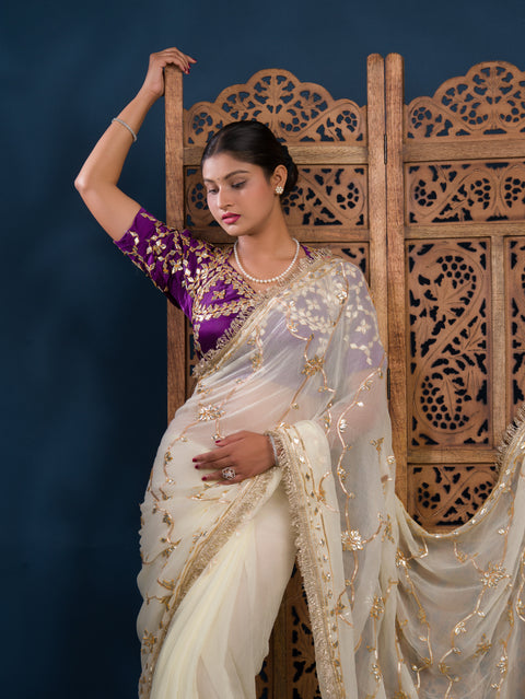 By Traditional  Saree