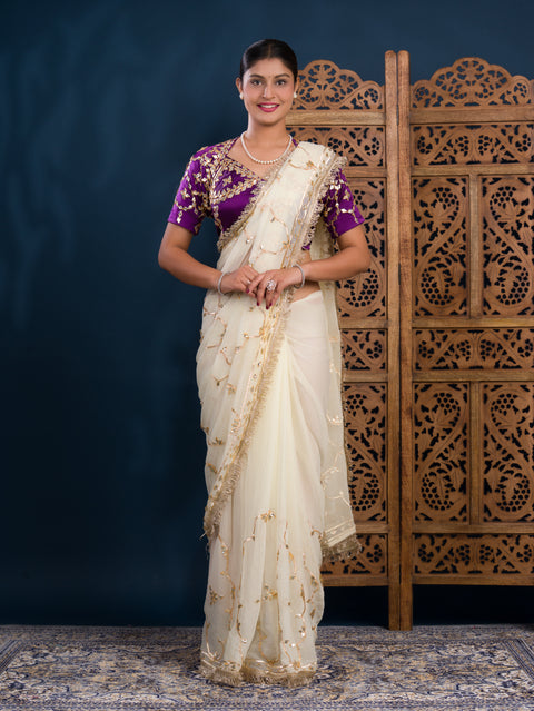 By Traditional  Saree